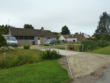P1100569 By July 2015 the bungalow had been sold and work was beginning to build two houses on the plot. The first was built alongside the bungalow to allow it to be used as a dwelling whilst the building work was undertaken. | Tim Gane