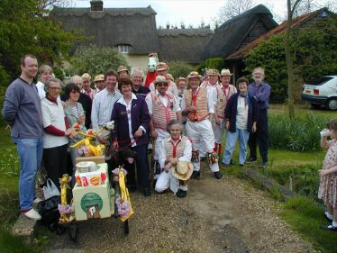 Standon Morris with members of the Meldreth Village Association outside the Dumb Flea on May Day 2000.  Current occupants Julie and Peter Draper are on the far right of the photo | Tim Gane