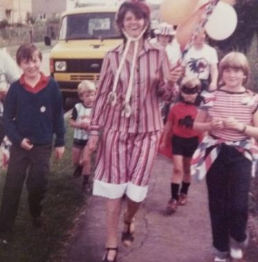 Betty leading some children to the Village Hall for a party she had organised to mark the 1977 Silver Jubilee | Photograph supplied by Ann Rogers