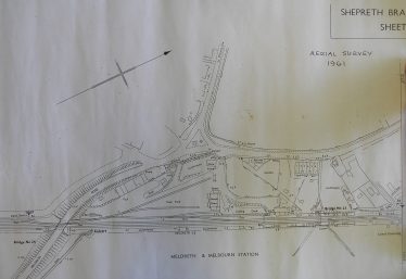 Aerial Survey of Meldreth and Melbourn Station and Goods Yard in 1961 showing the layout of the sidings.  Also notice the number of allotments around the area including beside the railway track.  No space was wasted. (Click on the image to enlarge) | Chelmsford Record Office