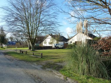 Photograph 2: Two of the three bungalows built in the late 1950s on the site of the old Addleston Charity Cottages | Tim Gane