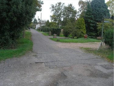 Section of the Meldreth Tramway set into the road at the top of Chiswick End ~2010 | Tim Gane