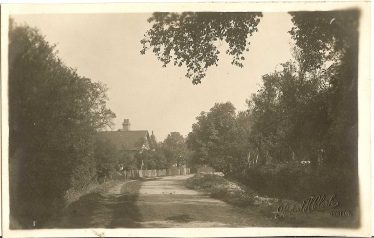 Chiswick End in the 1940s. Chiswick Farm is in the background. The scene is little changed from the photo above. | Robert H Clark postcard supplied by Ann Handscombe