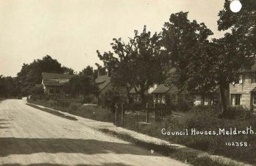 North End, showing the dilapidated Parish Room in the distance. 1920s. | Bell's Postcard supplied by Ann Handscombe