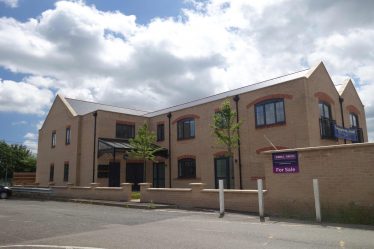 The flats that were built on the site of the transhipment warehouse, pictured in June 2018 | Photograph by Kathryn Betts