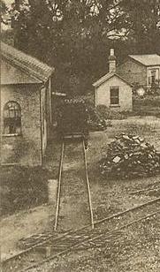 Detailed Photograph showing the Large Warehouse ~1925 -35. Unfortunately we don't have a photo showing the full warehouse. Note the railway line running immediately in front of the building and the turntable in the foreground which was operated by one of the yard's horses. Detailed Photograph showing the Large Warehouse ~1925 -35. Unfortunately we don't have a photo showing the full warehouse. Note the railway line running immediately in front of the building and the turntable in the foreground which was operated by one of the yard's horses. | Postcard, photo by J Bishop