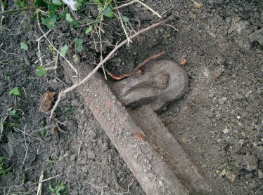 Small section of track and chair from the Meldreth Tramway located below the garden at 7 Whitecroft Road, Meldreth in 2003 Small section of track and chair from the Meldreth Tramway located below the garden at 7 Whitecroft Road, Meldreth in 2003 | Mike Dudley