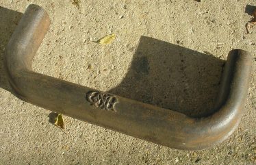 Fender from the fireplace in Meldreth signal box.  Note the GNR logo. | Photo by Tim Gane, courtesy of Mike Sharman