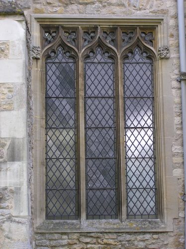 The east window in the north wall of the nave.  The square head of this window and the revived use of ogee (reverse curve) arches indicate a 16thc date for this window (though it is much restored). Could it be that this window was inserted when the altar was moved from the chancel to a position in front of the screen and more light was needed in this part of the church? | Peter Draper