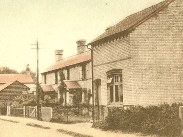 Foreground: the bakehouse operated by David Adcock | Postcard supplied by Ann Handscombe