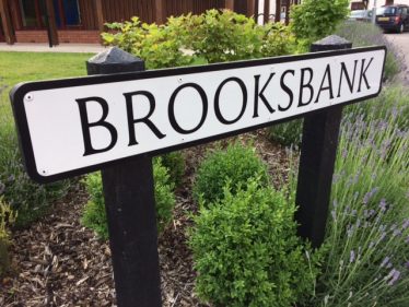 The road in Melbourn, next to 'The Hub', where the Police Station once stood, named after Ron Brooksbank | John Crawforth, June 2016