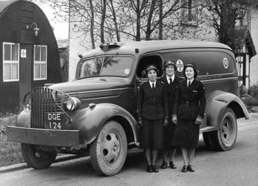 l/r Peggy Palmer, Joan Elbourn and Mary Hoy with the Red Cross ambulance in Meldreth High Street in 1950. | Photo supplied by Mary Hoy