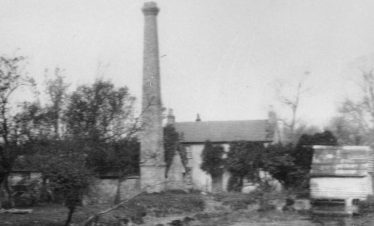Flambards Mill after the fire, with Mr Sheldrick's farmhouse in the background Flambards Mill after the fire, with Mr Sheldrick's farmhouse in the background | Photograph courtesy of Sandra Webb