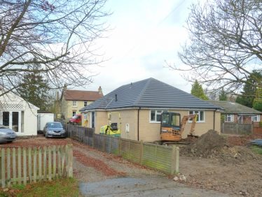 The new bungalow built in front of Norman Cottage in 2013. Photograph 5: The new bungalow being built in front of Norman Cottage in 2013. | Tim Gane