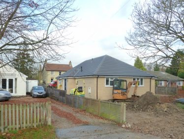 Photograph 5: The new bungalow being built in front of Norman Cottage in 2013. | Tim Gane