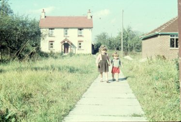 Photograph 4: Norman Cottage in 1959  The two little girls are Julie and Elaine Handscombe aged 4 and 2 respectively. | Ann Handscombe