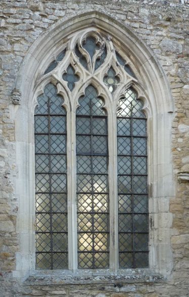 The east window of the north wall of the nave is the most complex of the tracery patterns, with interlocking pairs of ogee arches and an inverted tear drop in the head of the window The east window of the north wall of the nave is the most complex of the tracery patterns, with interlocking pairs of ogee arches and an inverted tear drop in the head of the window | Peter Draper