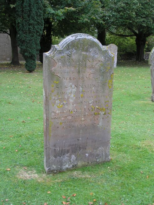 Grave of Mary Ann and Susannah Mortlock (Simeon's second and third wives), plus William, the son of Simeon and his first wife, Martha.  The stone stands in front of Meldreth Church close to the path. | photo by Tim Gane