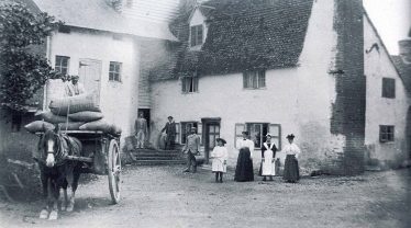 John Reed (on the cart) is pictured with the Peters family outside Topcliffe Mill, c. 1890 | Photograph courtesy of Mary Course