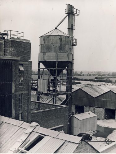 Silo at The Atlas factory with an air-raid siren on the top left | Robert Henry