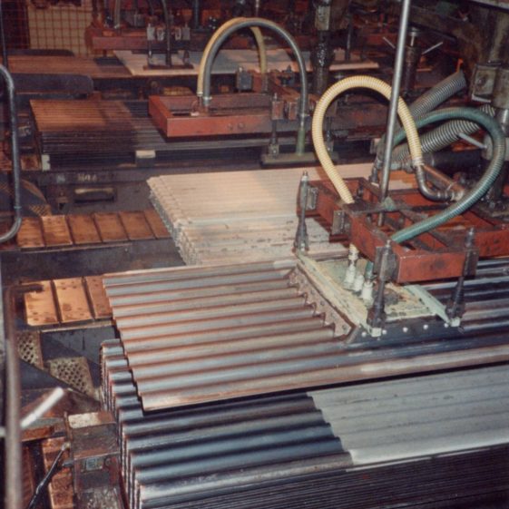 Step 7 Depiling - Lifting the Cured Sheets from the Oiled Tins Step 7 Depiling - Lifting the Cured Sheets from the Oiled Tins | Photo courtesy of Linda Clarke